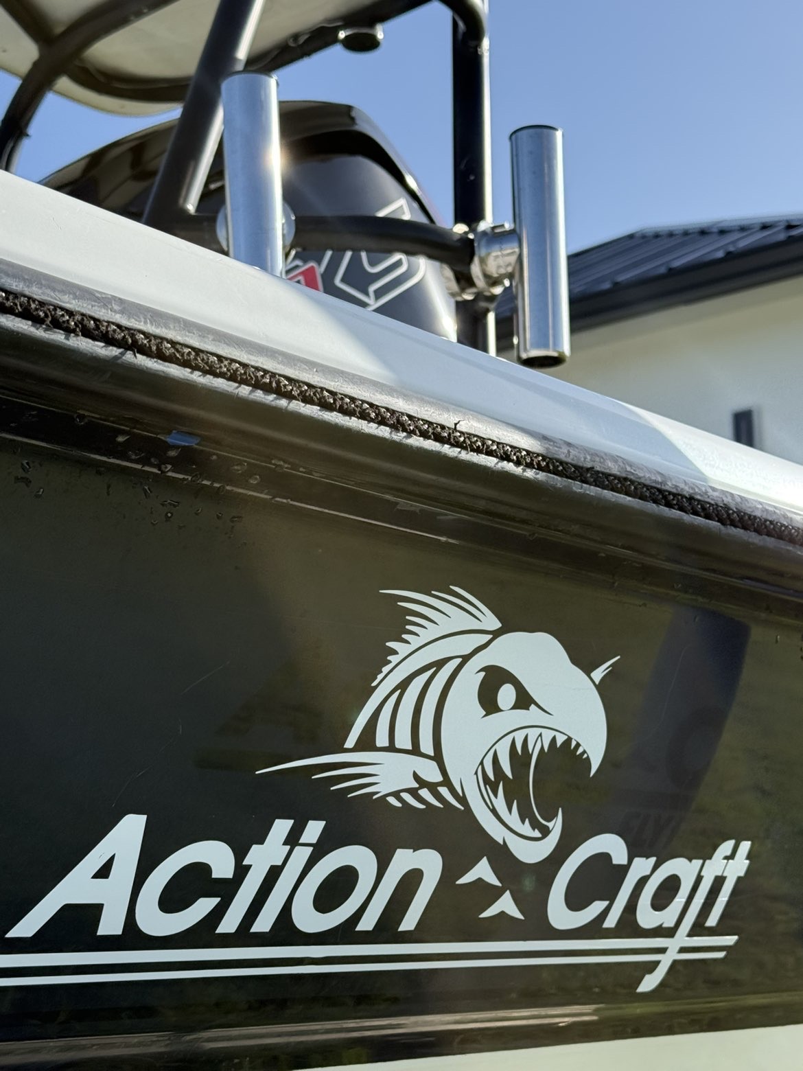 Boat side detail with marine logo